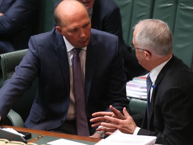 Immigration Minister Peter Dutton  and PM Malcolm Turnbull in Question Time in the House of Representatives Chamber, Parliament House in Canberra. Picture Kym Smith