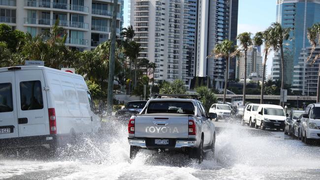 Flooding from the King tide at Budds Beach at Surfers Paradise was made worse by the approaching storm system. Picture Glenn Hampson