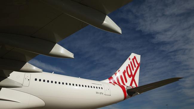 Virgin joined Qantas this week in cracking down on carry-on luggage weight. Picture: Brendon Thorne