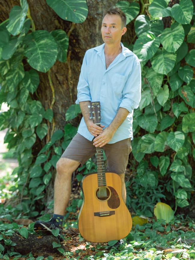 Gurrumil's long time collaborator Michael Hohnen with the late singer’s Martin guitar. Picture: Glenn Campbell