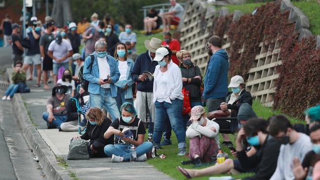 People from the Wollongong area line up for testing at the Wollongong Hospital. Picture: John Feder.