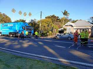 SMASH: One man was extricated from the car after becoming trapped for a short time. Picture: Contributed