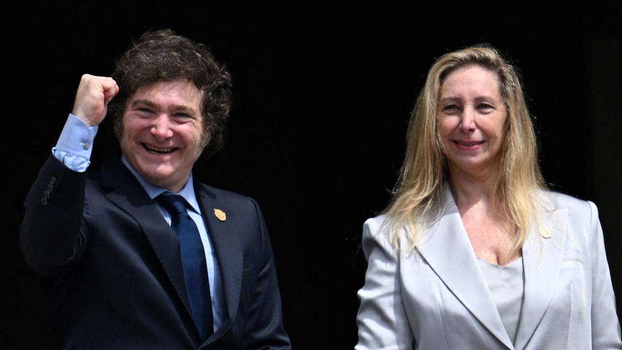 Argentina's President Javier Milei (L) gestures next to his sister and Secretary-general of the Presidency Karina Milei during his inauguration ceremony. Bill includes declaring a state of economic emergency and privatising public companies. Picture: AFP