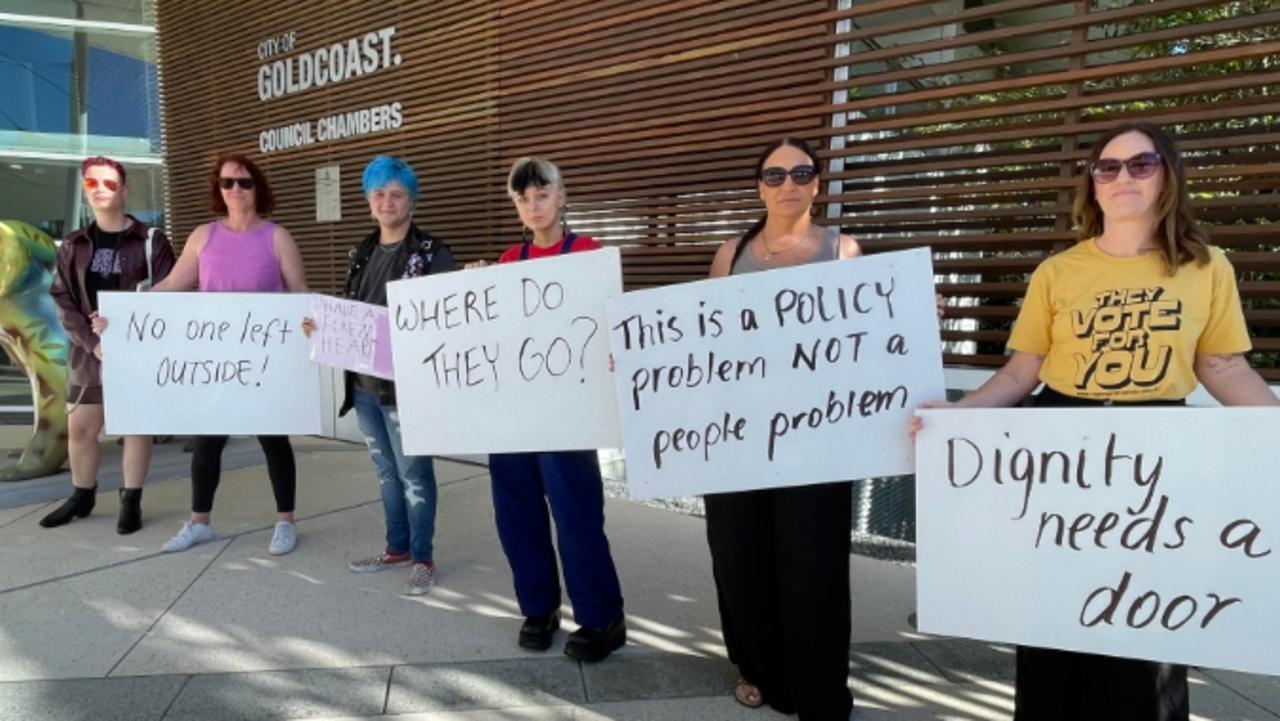 Supporters of the homeless in Carey Park stage a protest outside the Gold Coast City Council chambers on council's tough compliance policy.