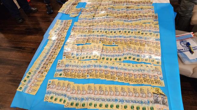 Cash seized at theWahroonga address. Picture: NSW Police