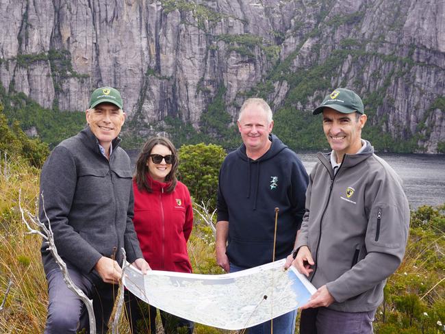 Minister for Parks Nick Duigan, Sophie Muller Deputy Secretary Parks and Wildlife Service, West Coast Council Mayor Shane Pitt and Next Iconic Walk project director Keith Ryan in the Tyndall Range.  Picture: Tasmanian Government