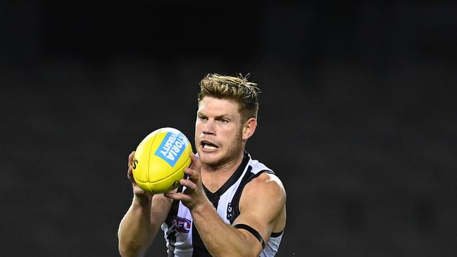 MELBOURNE, AUSTRALIA – MARCH 20: Taylor Adams of the Magpies marks during the round 1 AFL match between the Western Bulldogs and the Collingwood Magpies at Marvel Stadium on March 20, 2020 in Melbourne, Australia. (Photo by Quinn Rooney/Getty Images)