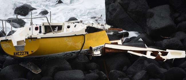 A yacht has been abandoned on the rocks at Burleigh Headland. (Photo/Steve Holland)