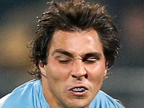 NEW PLYMOUTH, NEW ZEALAND - MAY 31: Nick Phipps of the Waratahs is tackled during the round 16 Super Rugby match between the Chiefs and the Waratahs at Yarrow Stadium on May 31, 2014 in New Plymouth, New Zealand. (Photo by Hagen Hopkins/Getty Images)