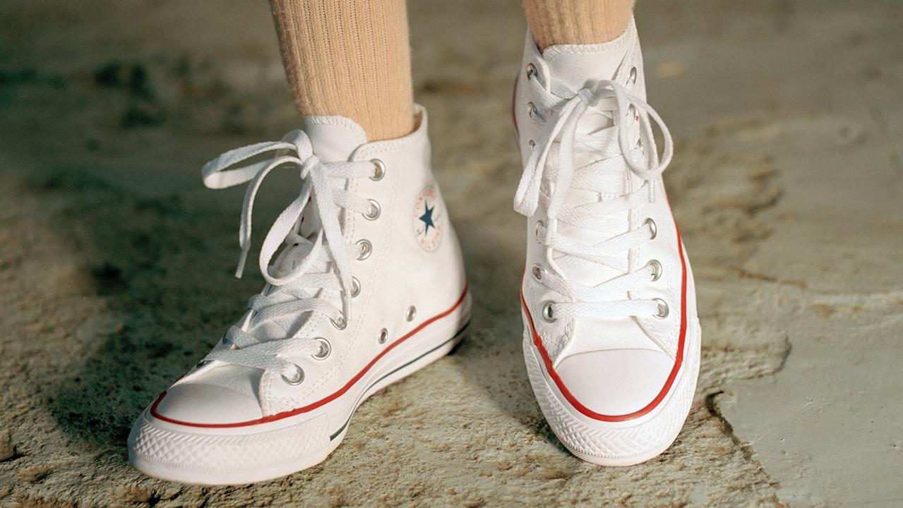 With their ability to be dressed up or down to suit just about any outfit, a pair of white sneakers has well and truly earned its place in your wardrobe – so here's the top styles to buy. Image: Converse.