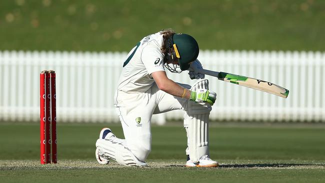Will Pucovski stays down after being struck on the final afternoon of the Australia A game on Tuesday Picture: Getty Images