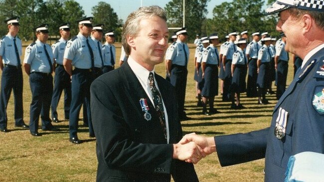 Former Queensland undercover police officer Keith Banks receiving the Queensland Police Valour Award from Police Commissioner Jim O'Sullivan in July 1994.