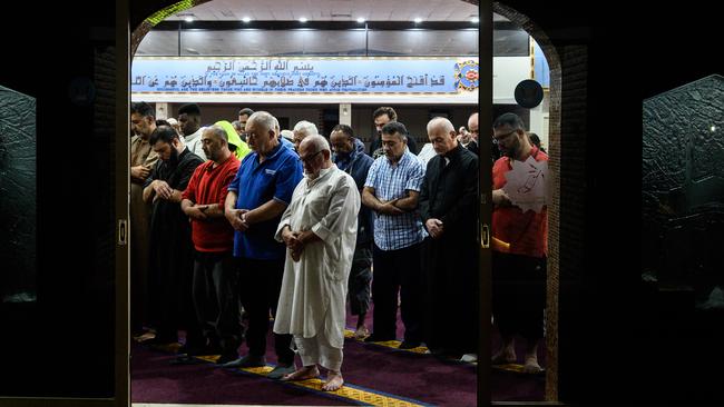 People gather for morning prayers at Lakemba Mosque today. Picture: Getty