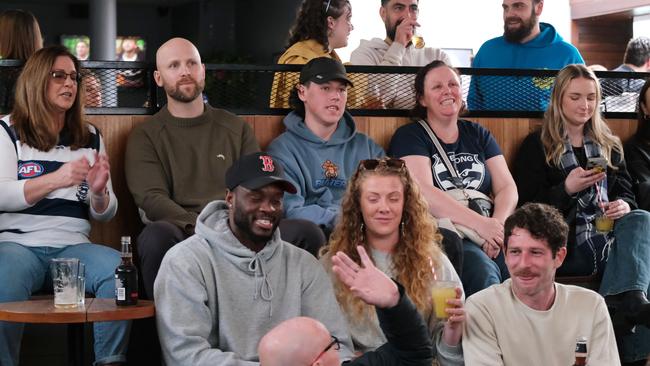 Geelong Cats fans watching the Geelong and Brisbane preliminary final at the Sporting Globe in Geelong with former Cats player Gary Ablett Jnr. Picture: Mark Wilson