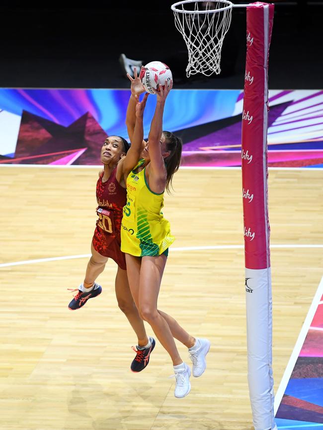 Cara Koenen of Australia soars over Stacey Francis-Bayman of England. Picture: Alex Davidson/Getty Images