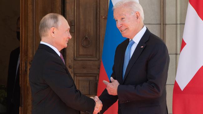 US President Joe Biden and Russian President Vladimir Putin shake hands as they arrive at Villa La Grange in Geneva, for the start of their summit on June 16, 2021. Picture: Saul Loeb/AFP