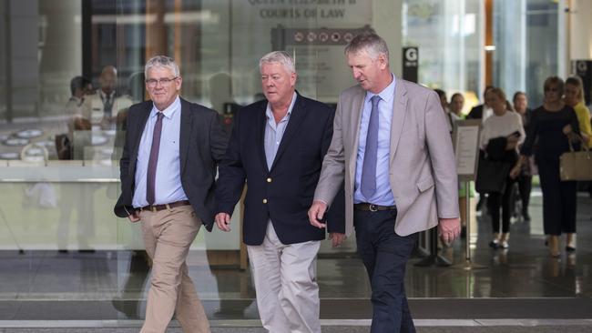 Neill, left, John and Denis Wagner leave the Supreme Court in Brisbane, where they are suing talkback radio host Alan Jones. Picture: AAP