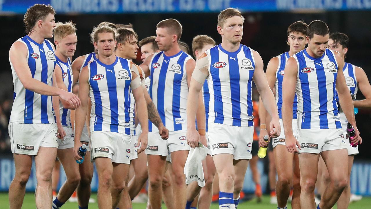 MELBOURNE, AUSTRALIA - JUNE 12: The Kangaroos look dejected after a loss during the 2022 AFL Round 13 match between the North Melbourne Kangaroos and the GWS Giants at Marvel Stadium on June 12, 2022 in Melbourne, Australia. (Photo by Michael Willson/AFL Photos via Getty Images)