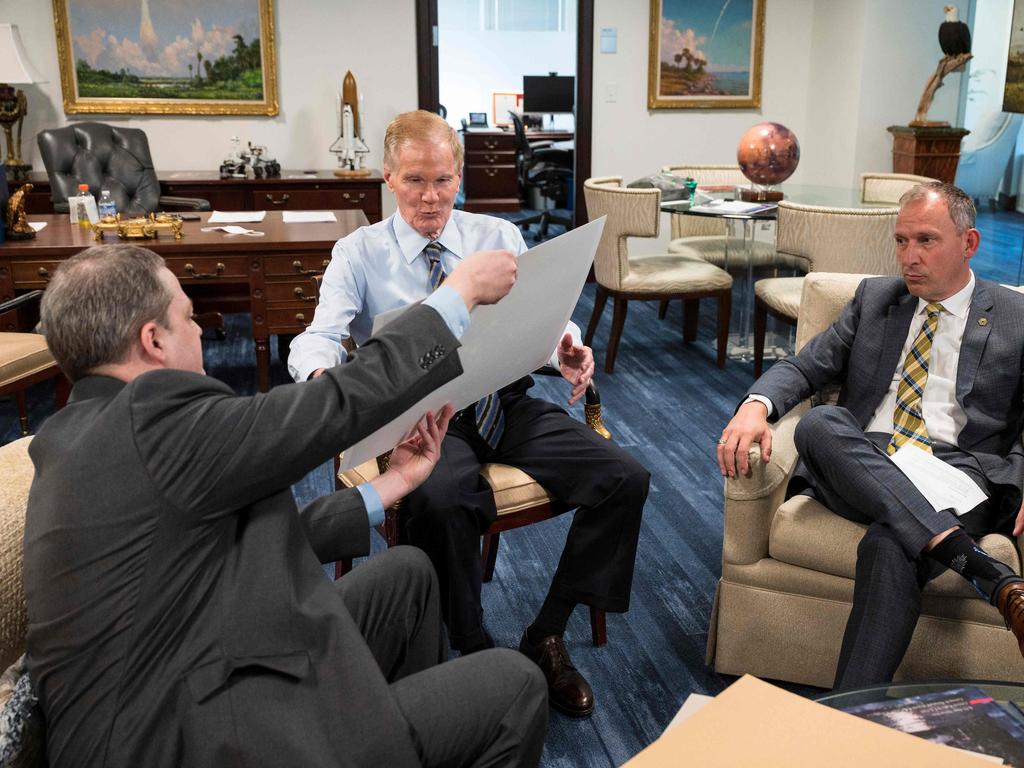 NASA officials Klaus Pontoppidan, Bill Nelson and Thomas Zurbuchen look at the first full-colour images from the James Webb Space Telescope. Picture: AFP