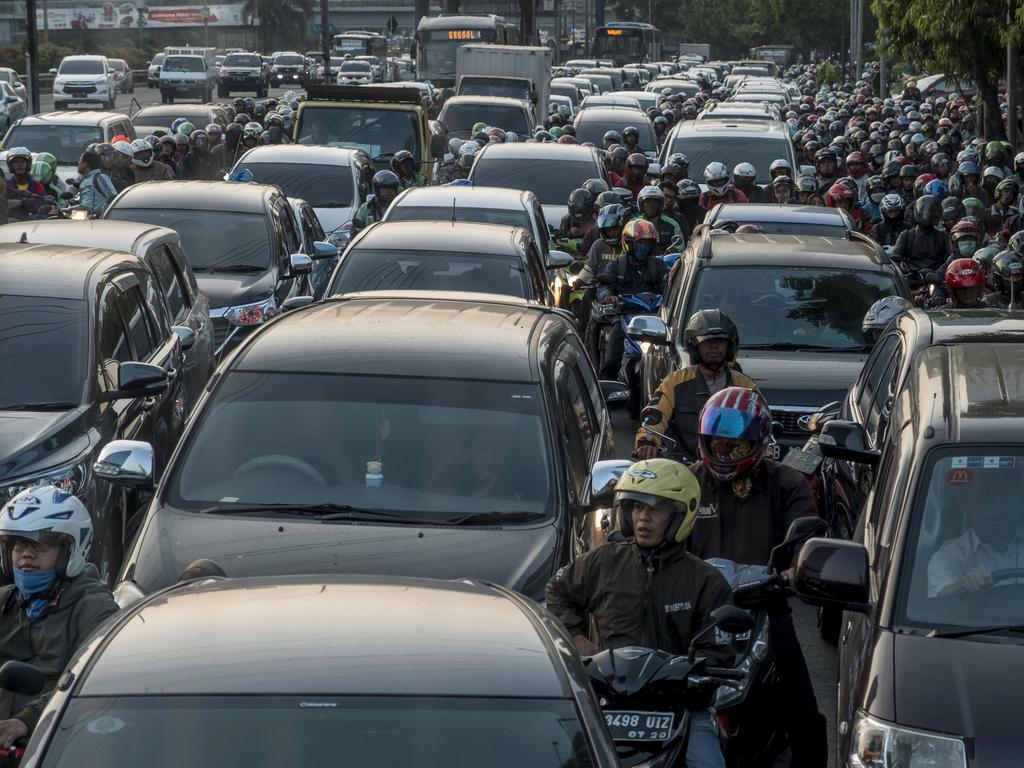 Commuters wait in a traffic jam during afternoon rush hour in Jakarta. Picture: AFP/Bay Ismoyo