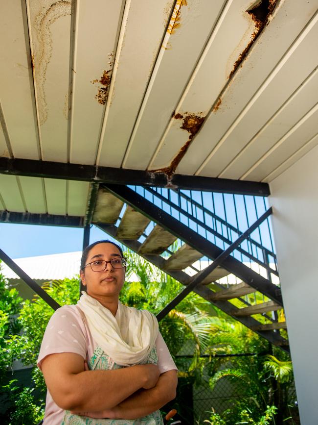 Sayeda Bushra stands below rusted floor of her home in Bellamack. Photograph: Che Chorley