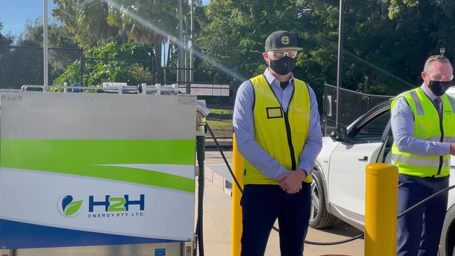 H2H staff stand next to the new hydrogen refuelling station as a hydrogen car is being refuelled at Cleveland’s research station.