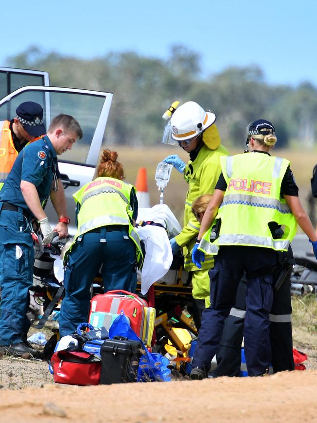 Emergency services attend a 3 person fatal crash involving four vehicles south of Townsville. Picture: Alix Sweeney