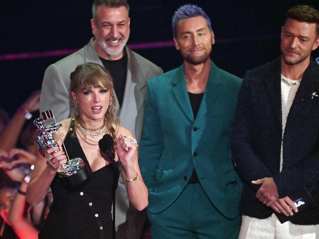 Taylor Swift wins the first award of the night. Picture: Timothy A. CLARY / AFP