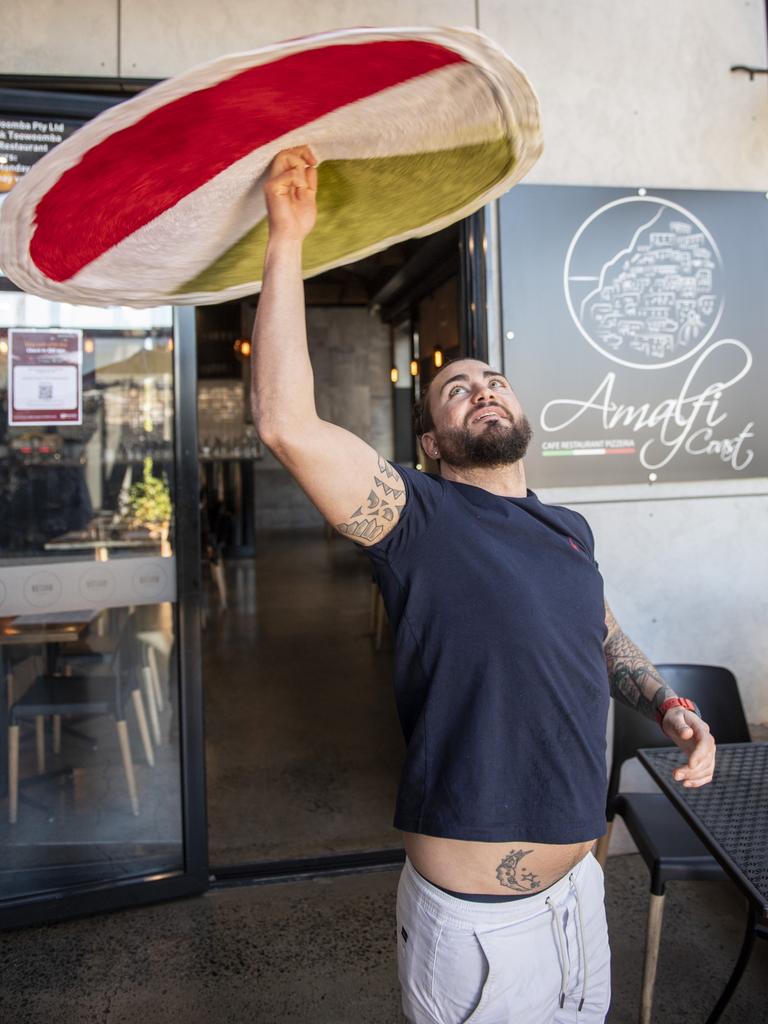 Chef Marco de Gregorio tests his dough spinning skills at Amalfi Cafe Restaurant, Walton Stores. Thursday, September 23, 2021. Picture: Nev Madsen.