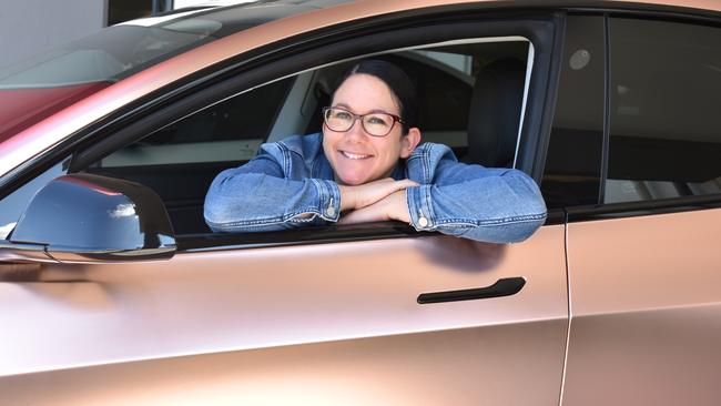 Micky Hasted and her husband bought an electric car last year and say it's zippy, low-maintenance and quick to charge. Photo: Ebony Graveur