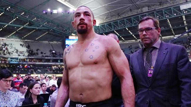 Robert Whittaker looks dejected after defeat against Israel Adesanya. Pic: AAP