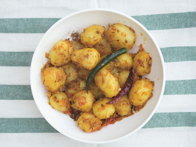 Bombay potatoes from Roma’s Recipes, a cookbook honouring the late mother of cricket great Isa Guha.