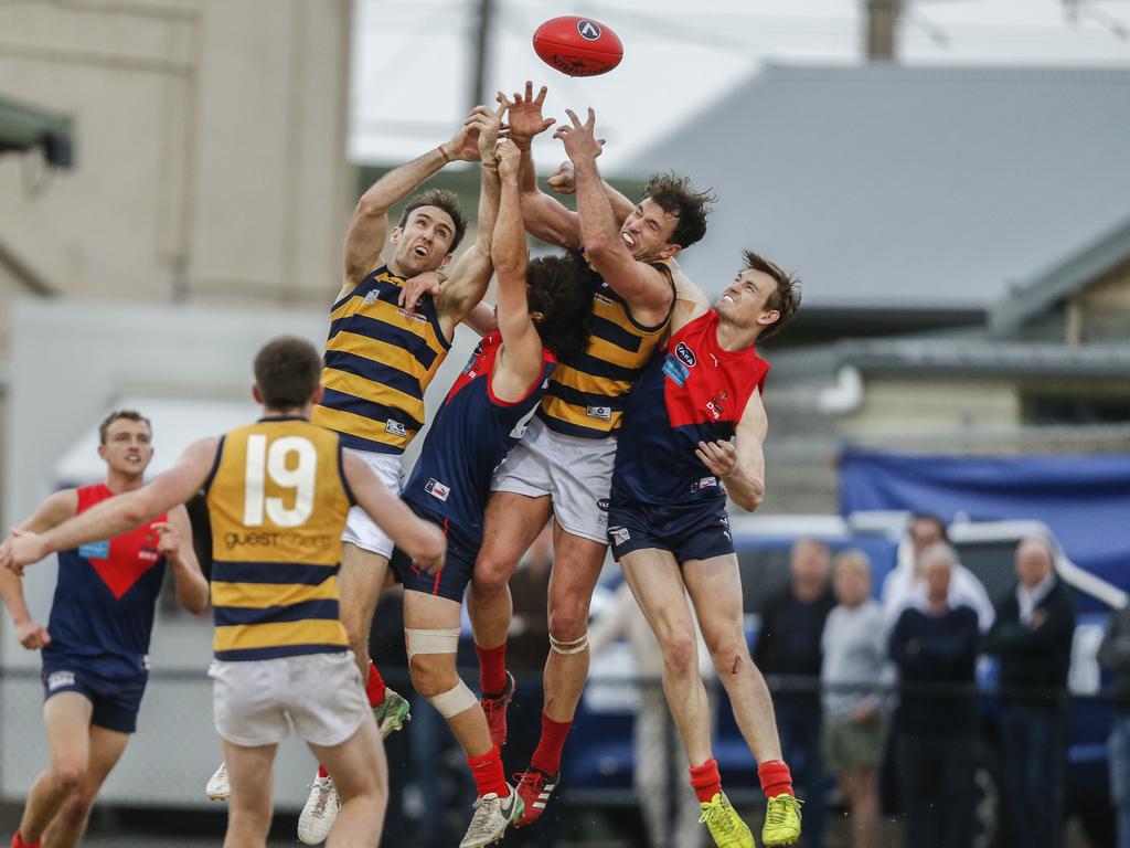 VAFA: Old Brighton and Old Melburnians players fly for the mark. Picture: Valeriu Campan