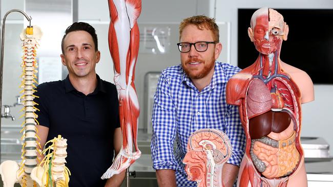 Griffith University teachers Dr Mike Todorovic and Dr Matt Barton have nearly half a million online followers. Picture: David Clark