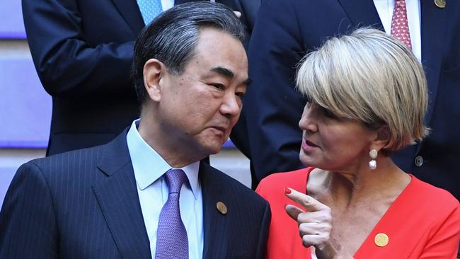 China Foreign Minister Wang Yi and Julie Bishop pose at the Palacio San Martin during the G20 foreign ministers' meeting. Picture: AFP.