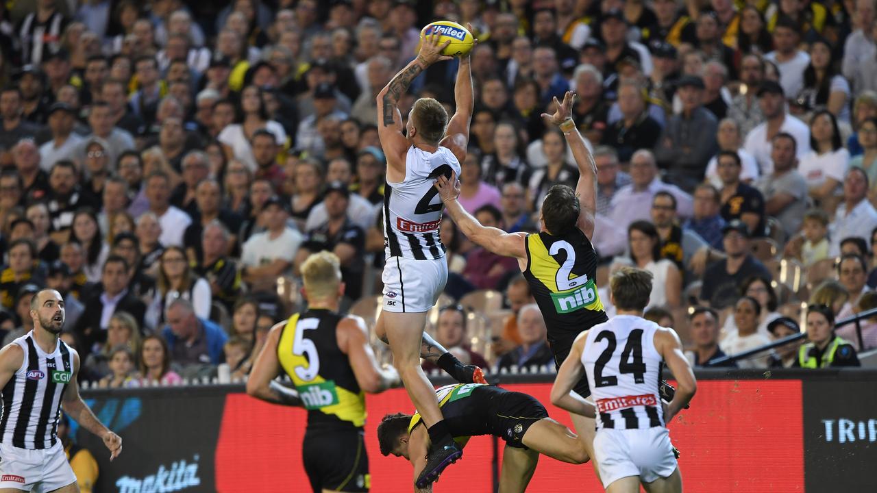 Jordan De Goey takes a screamer against Richmond on Thursday night.