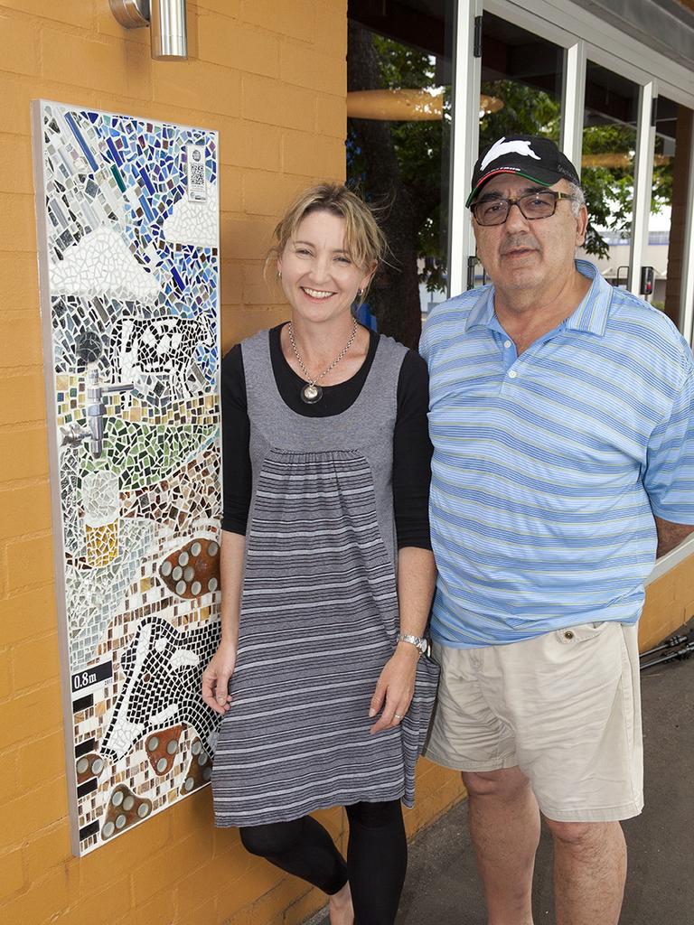 Toowoomba Arts Council's Splashing Back Art Trail has been selected as a finalist in two categories for the National Street Art Awards in 2020. Toowoomba Arts Council presidents, Mary-Kate Thomson (left) with Michael Coorey, in front of The Spotted Cow Hotel with her mosaic artwork back in 2013.