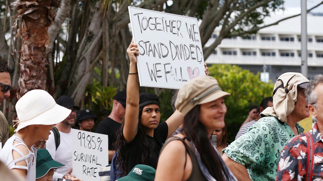 A Freedom Rally was held on the Esplanade north of Muddy's on Saturday, before around 700 supporters marched down the Esplanade and past the children's playground, down to the lagoon and back. Janelle Raumati of Smithfield carries a message along the march. PICTURE: Brendan Radke