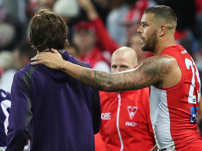 Sydney's Lance Franklin goes up to Fremantle's Joel Hamling after he got him with an elbow in the first half during AFL match between the Sydney Swans and Fremantle Dockers at the SCG. Picture. Phil Hillyard