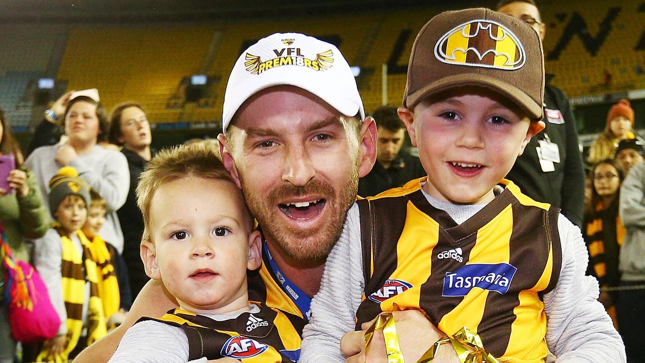 Brendan Whitecross and his kids celebrate after the 2018 VFL Grand Final. (Photo by Michael Dodge/AFL Media/Getty Images)