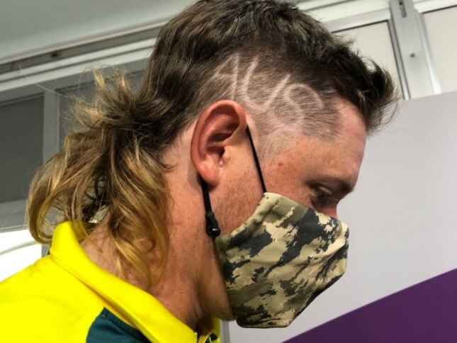 Golfer Cameron Smith with "Aus" shaved in to the side of his head