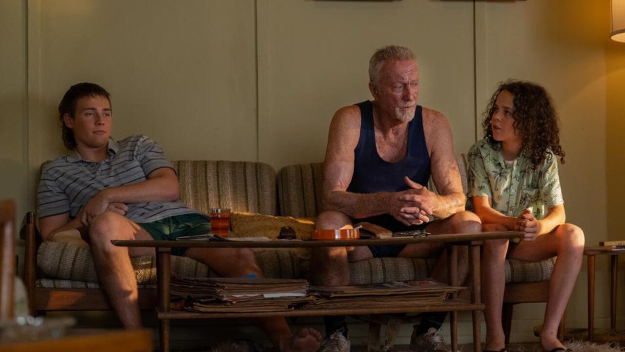 (L to R) Gus Bell (Lee Halley), Slim Halliday (Bryan Brown) and Eli Bell (Felix Cameron) in a scene from Boy Swallows Universe