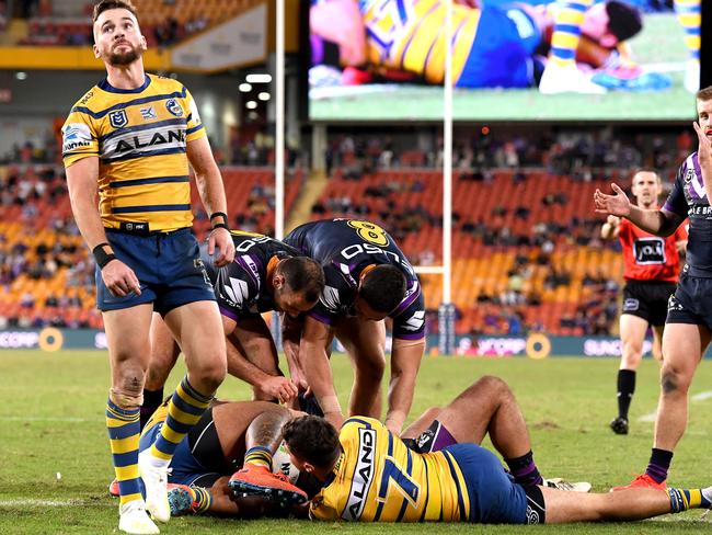 Clint Gutherson of the Eels looks dejected after yet another Storm try. Picture: Bradley Kanaris/Getty Images