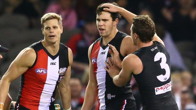 Paddy McCartin and Jack Steven, Sebastian Ross and Nick Riewoldt. (Photo by Scott Barbour/AFL Media/Getty Images)