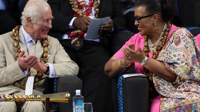 King Charles speaks with Patricia Scotland, Secretary General of The Commonwealth, at CHOGM in Samoa.