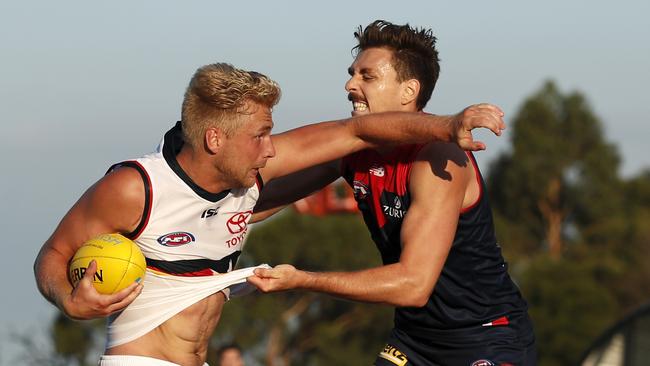 Jake Lever takes on his old side Adelaide in a Marsh Series game.