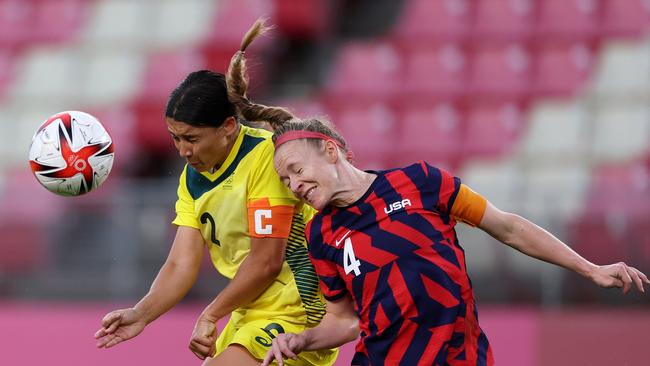 Sam Kerr #2 of Team Australia competes for a header with Becky Sauerbrunn #4 of Team United States during the Women's Bronze Medal match between United States and Australia on day 13 of the Tokyo 2020 Olympic Games at Kashima Stadium on August 05, 2021 in Kashima, Japan. (Photo by Elsa/Getty Images)