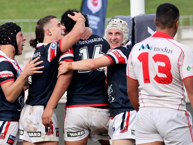 SUNDAY TELEGRAPH: APRIL 9, 2022: Roosters players celebrate after a try in the second half, Harold Matthews Cup,  Sydney Roosters Vs St George Dragons at Jubilee Stadium, Kogarah. Roosters win 54 to Dragons 6.Picture: Damian Shaw