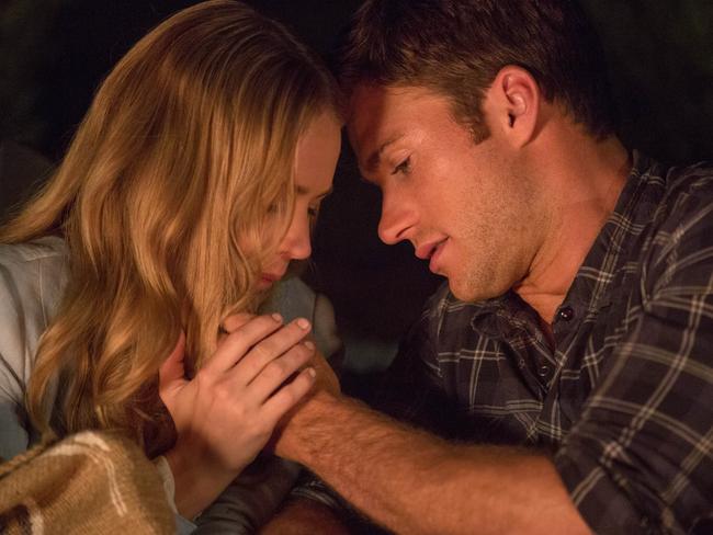 Britt Robertson and Scott Eastwood in a scene from film The Longest Ride