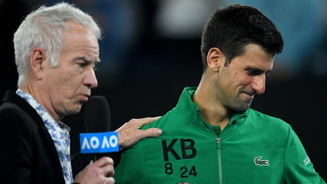 Novak Djokovic and John McEnroe at the Australian Open